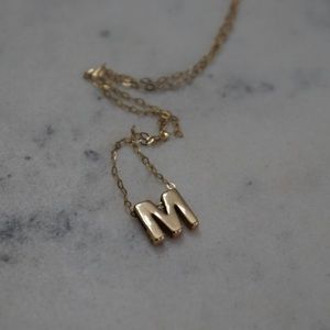 Mini block “M” initial necklace in 10k gold